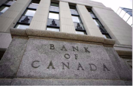 Bank of Canada Holds Rates Steady, But Pares Bond-Buying Program