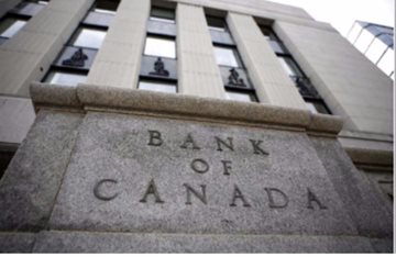Bank of Canada Holds Rates Steady But Pares Bond-Buying Program